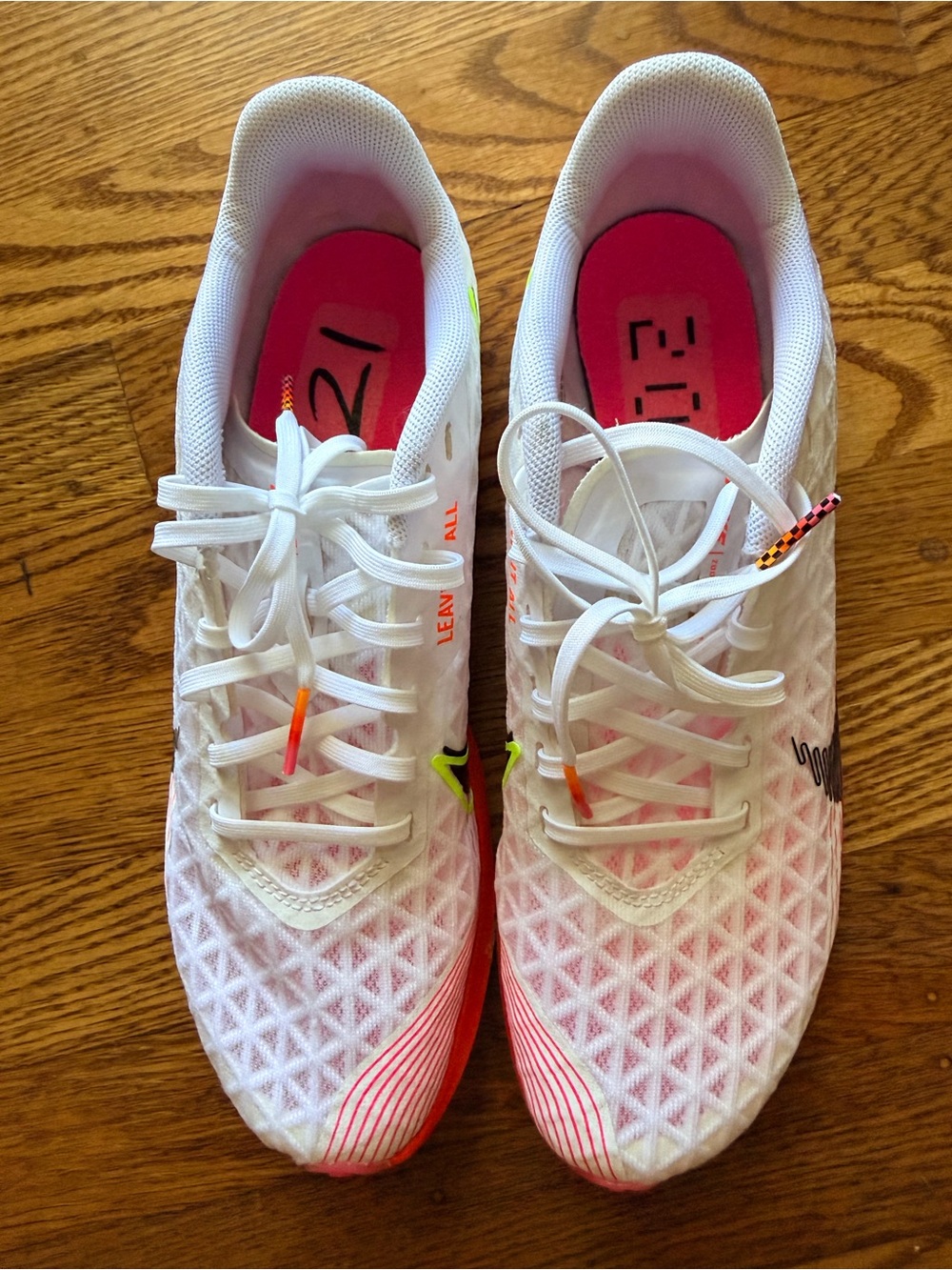 Nike Women's White Running Shoes with Pink and Neon Accents